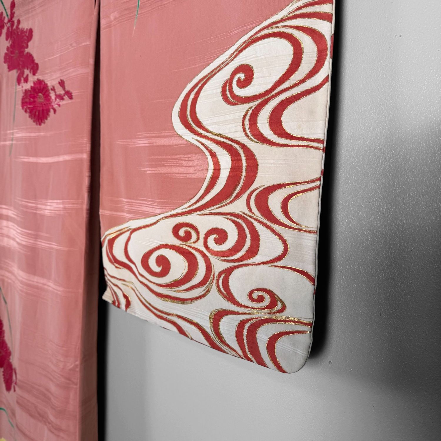 Salmon-pink Japanese silk kimono with chrysanthemums and embroidered accents, 1950s.