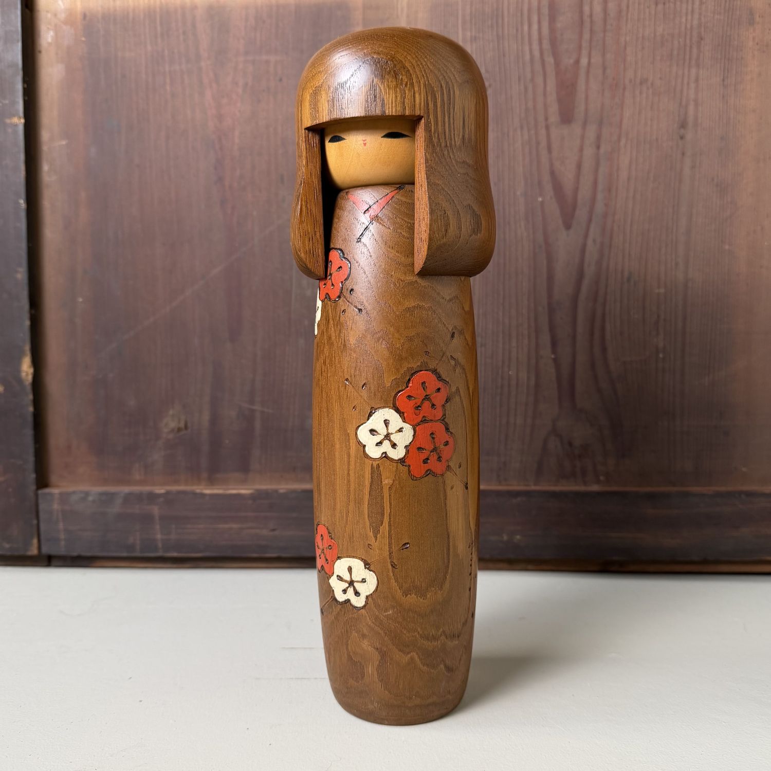 Vintage Usaburo Kokeshi with Ume Blossom, 1970–1980 Vintage Usaburo Kokeshi with Ume Blossom, 1970–1980