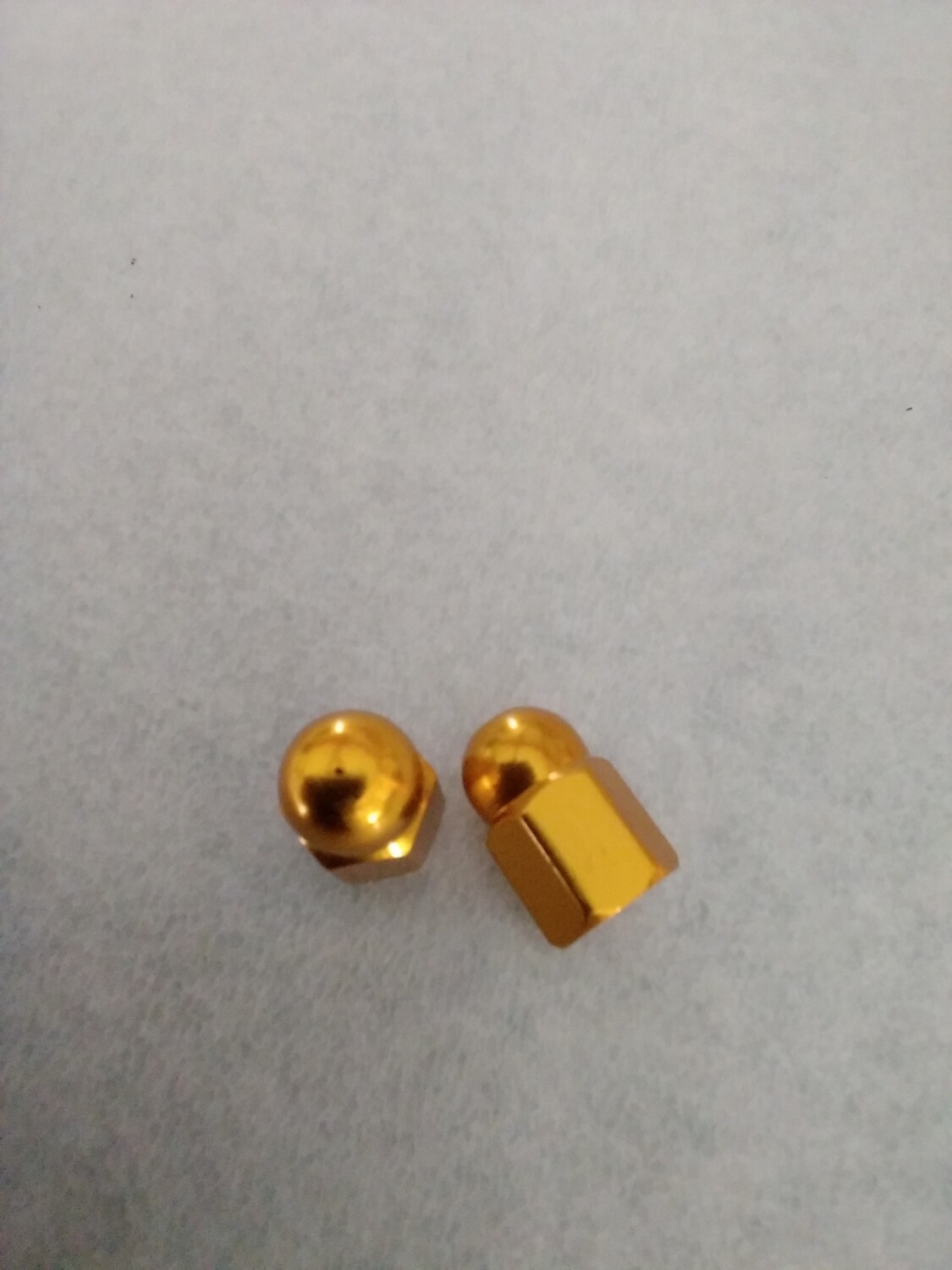 Ventieldopje moer goud