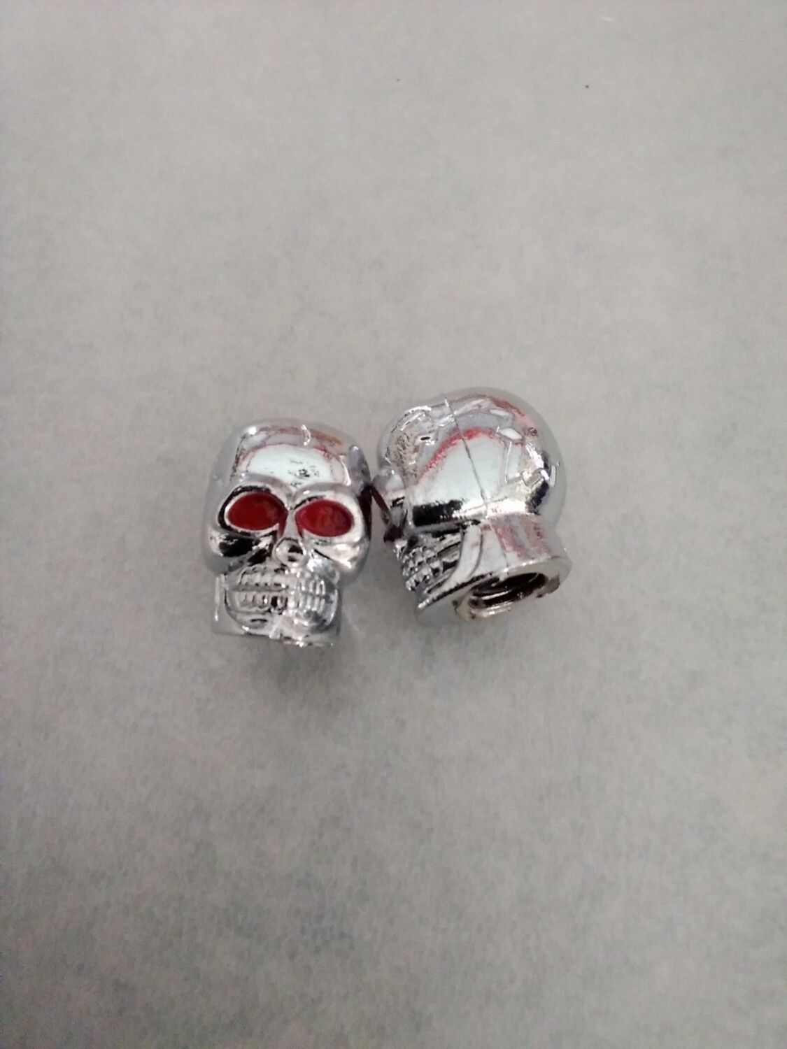 Ventieldopje doodskop zilver
