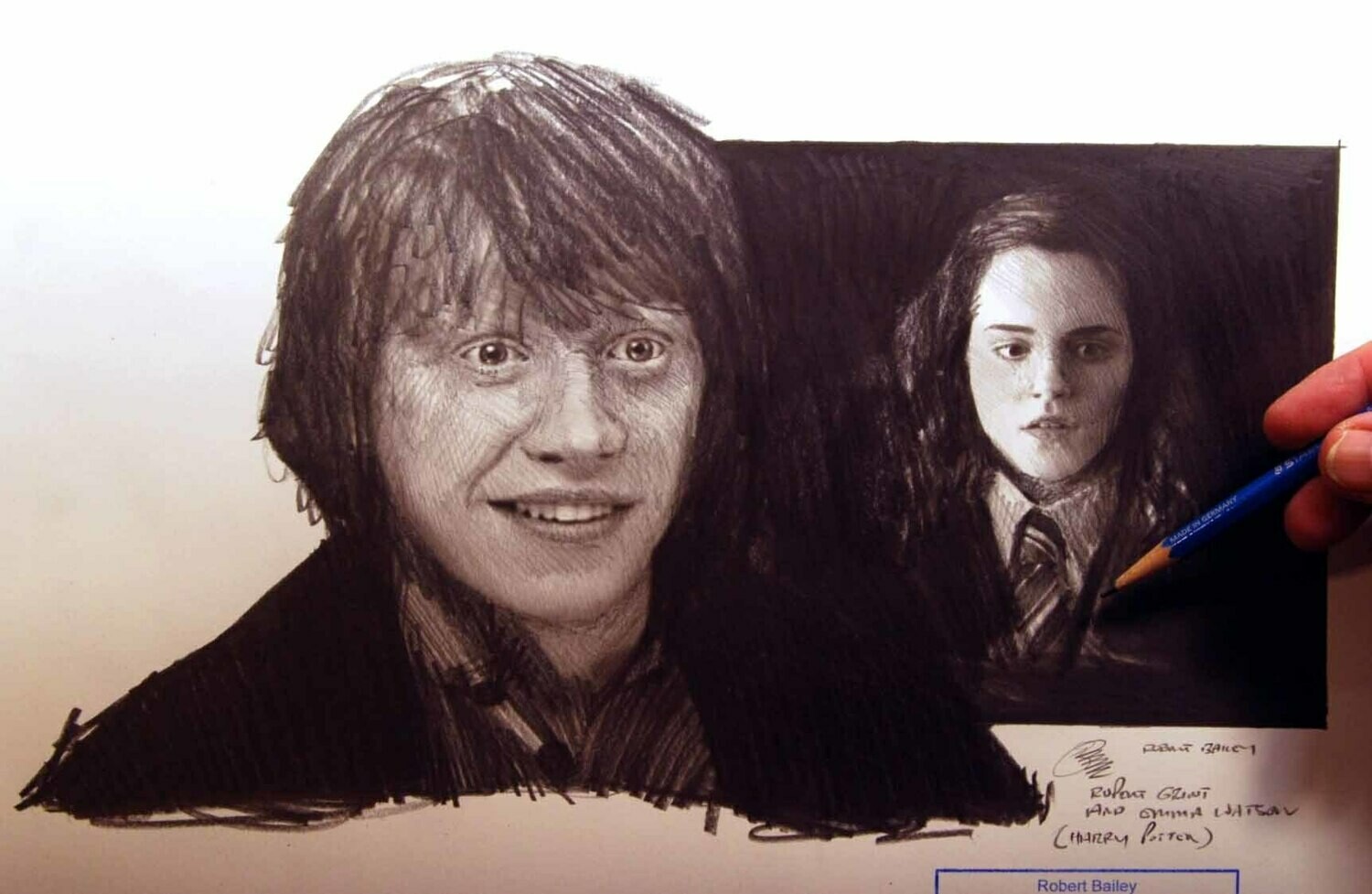 Rupert Grint and Emma Watson.
