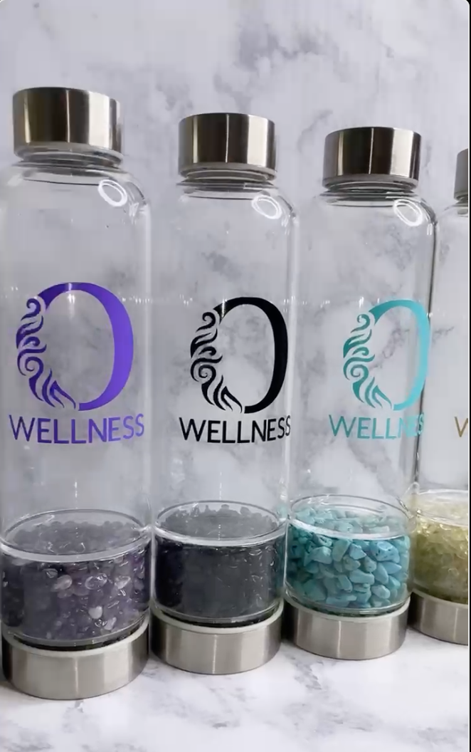 Opulence Healing Crystal Bottle with unique frequency and protective slip cover.