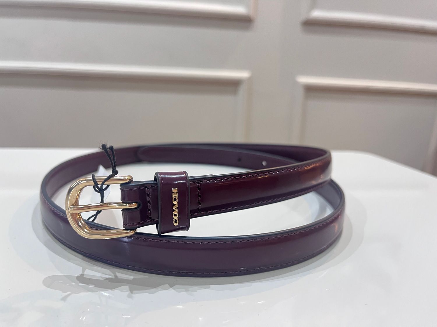 CINTURÓN COACH VINO