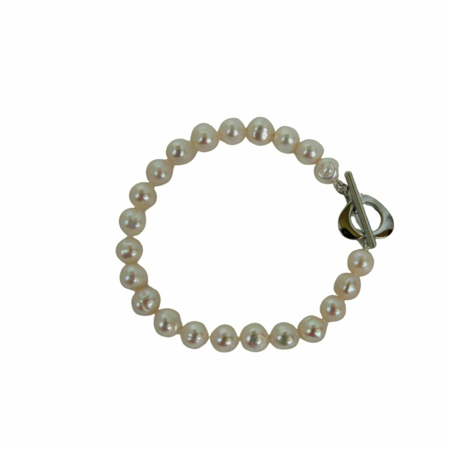 11mm freshwater cultured pearl bracelet with heart clasp.