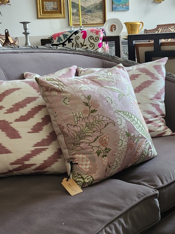 Multi colored silk lampas pillow, mostly pale pinks, green and silver.