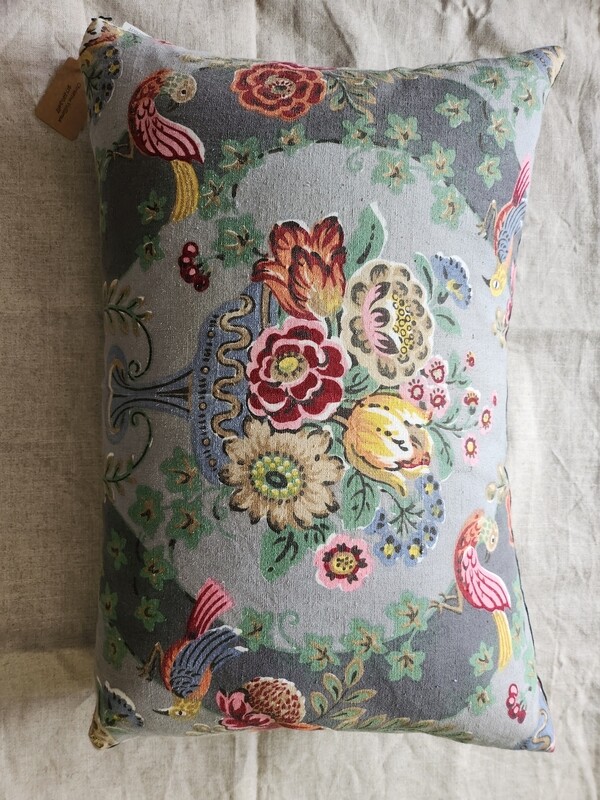 Pillow in antique French floral cotton.