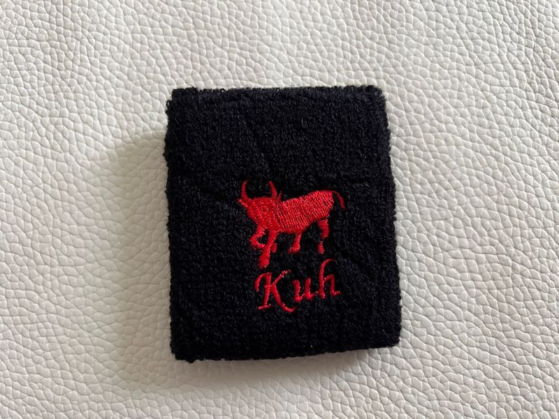 Handgelenk Schweißband - schwarz mit roter Kuh
