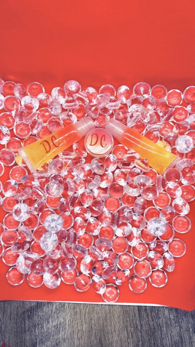 Lip gloss that comes with lip scrub