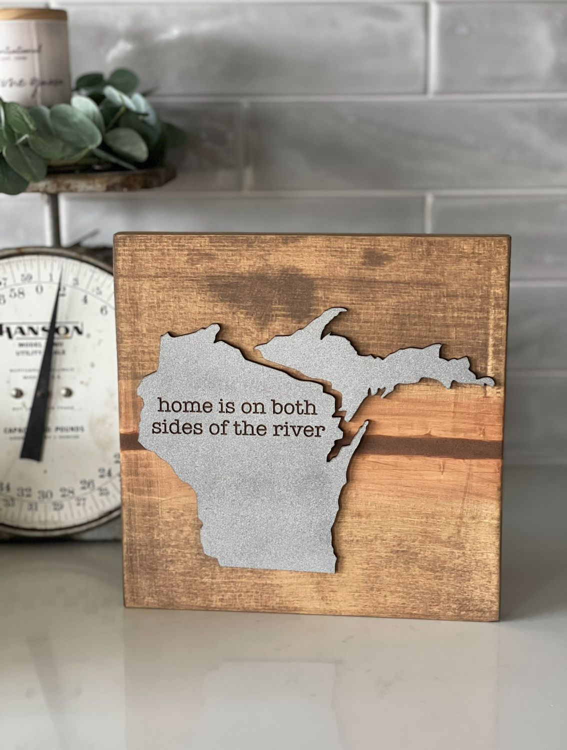 HOME IS ON BOTH SIDES OF THE RIVER