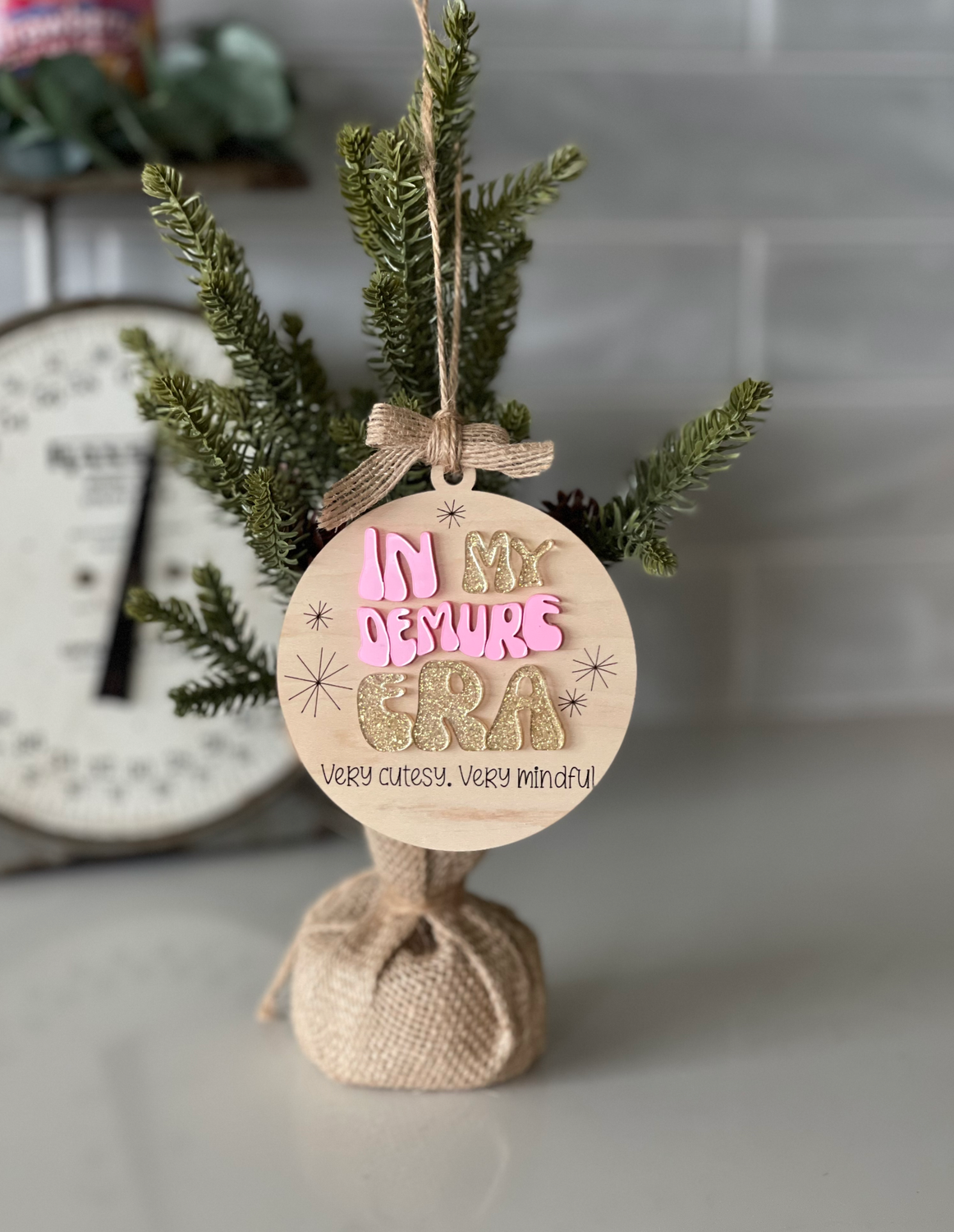 DEMURE ORNAMENT