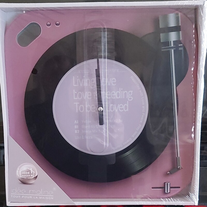 Horloge tourne disque