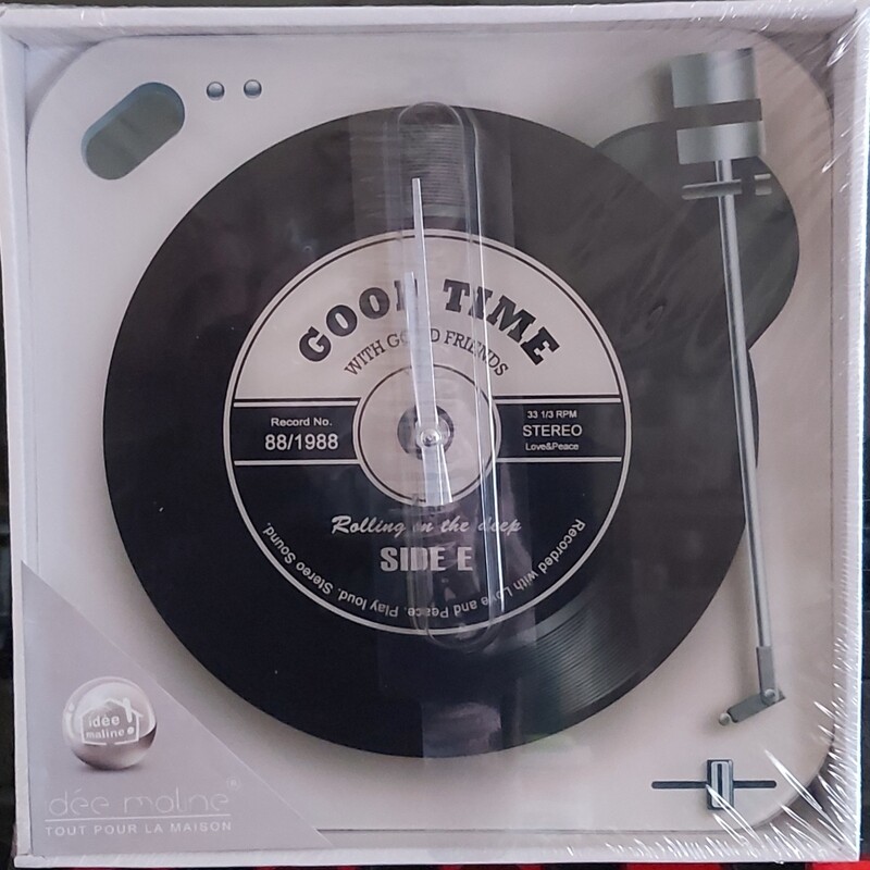Horloge tourne disque