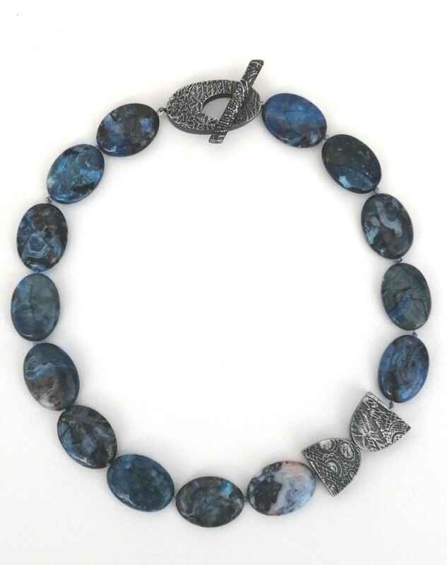 Blue agate and silver detailed elements