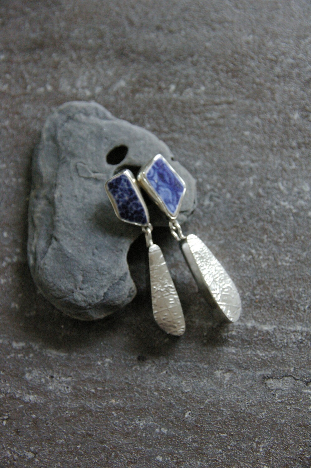 Blue pottery etched drops