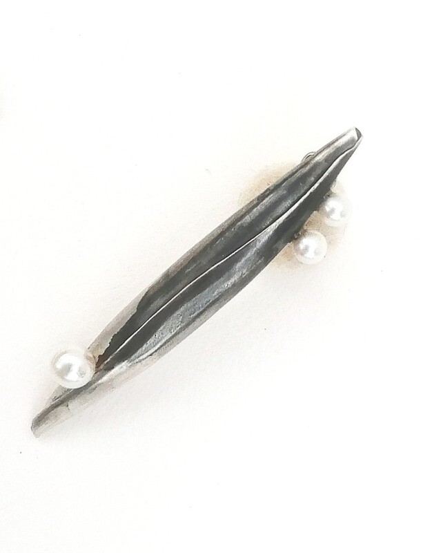 Wrap over brooch