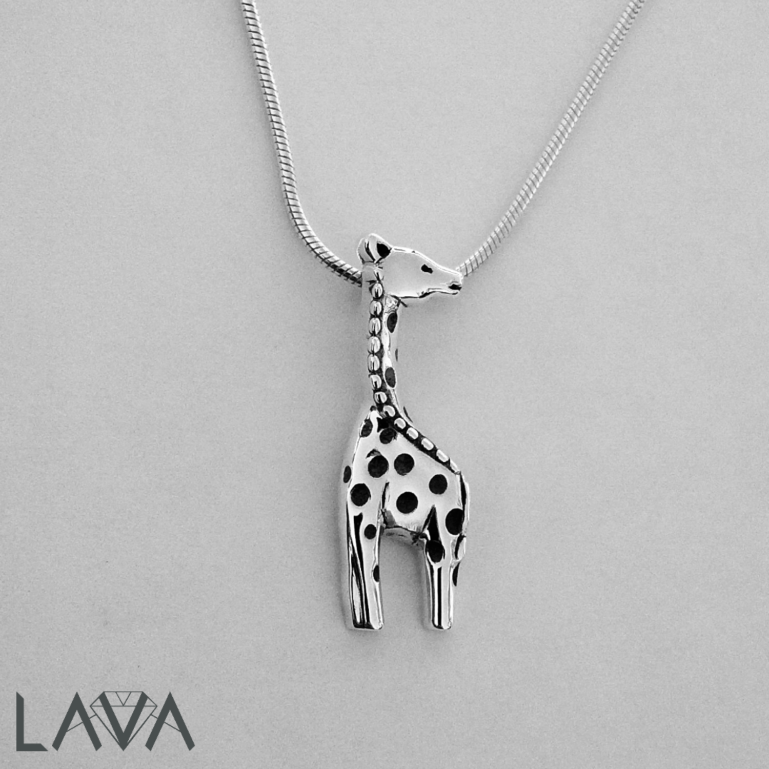 Giraffe pendant on sterling silver snake chain