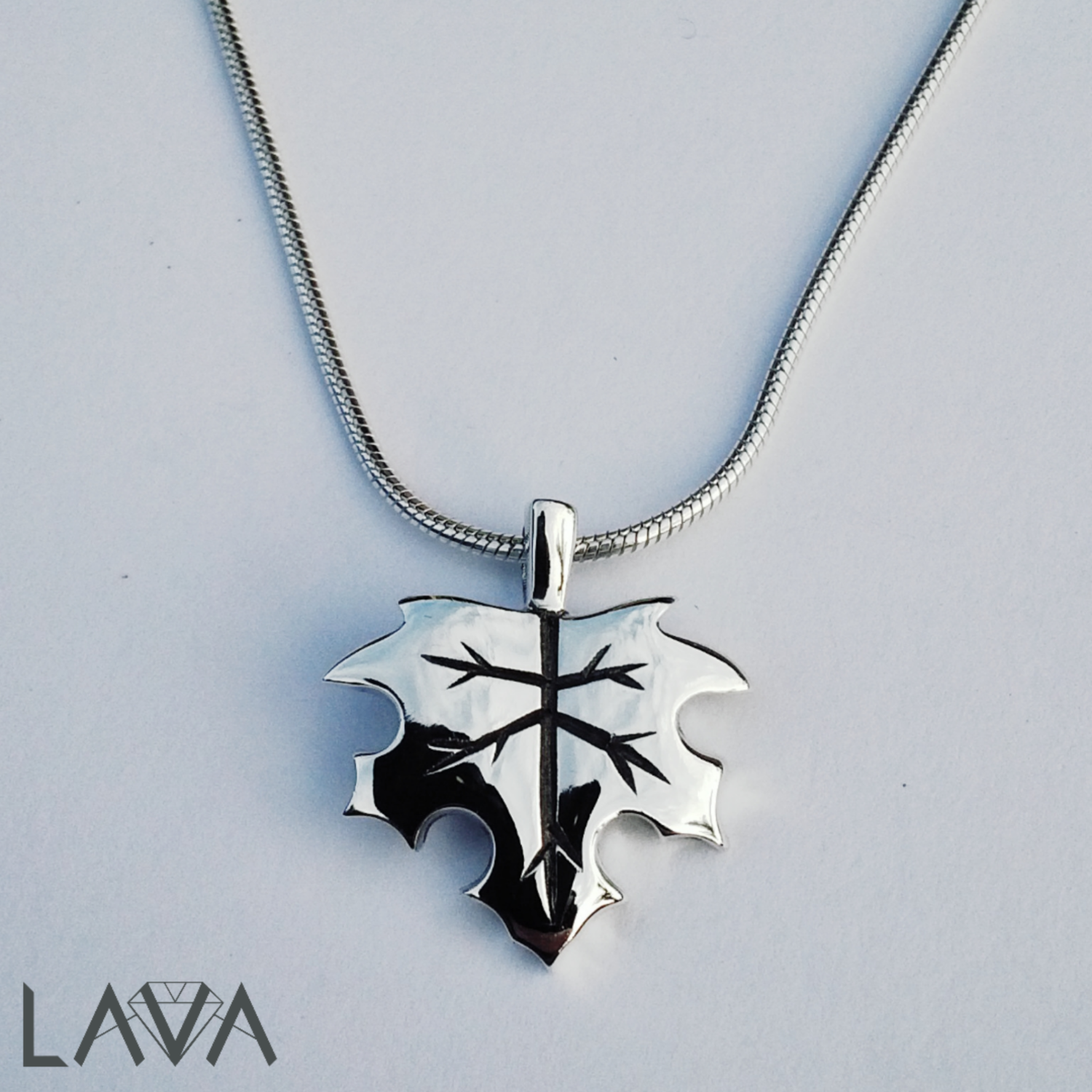 Maple leaf pendant on sterling silver snake chain