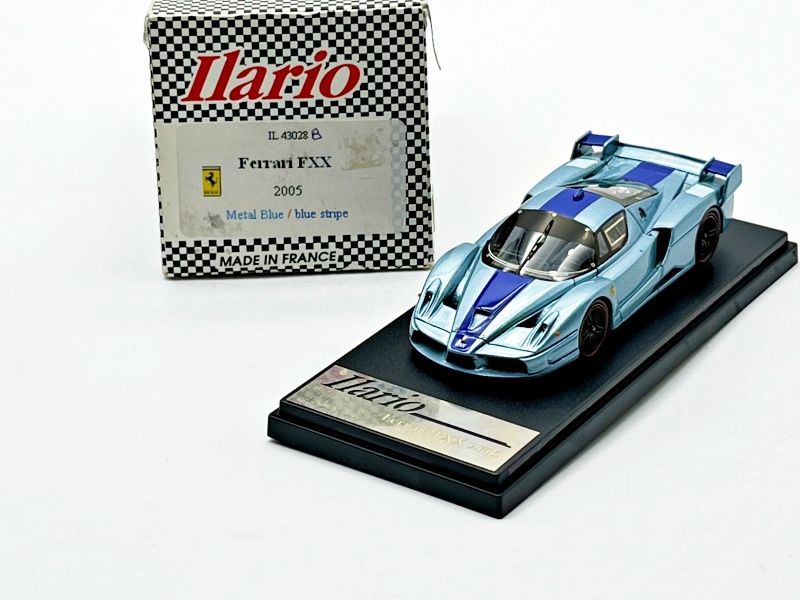 ILARIO - IL43023B - FERRARI FXX 2005 METAL BLUE WITH BLUE STRIPE