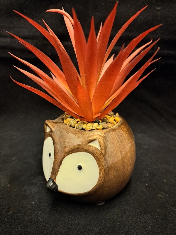 planter dierenhoofd met plantje