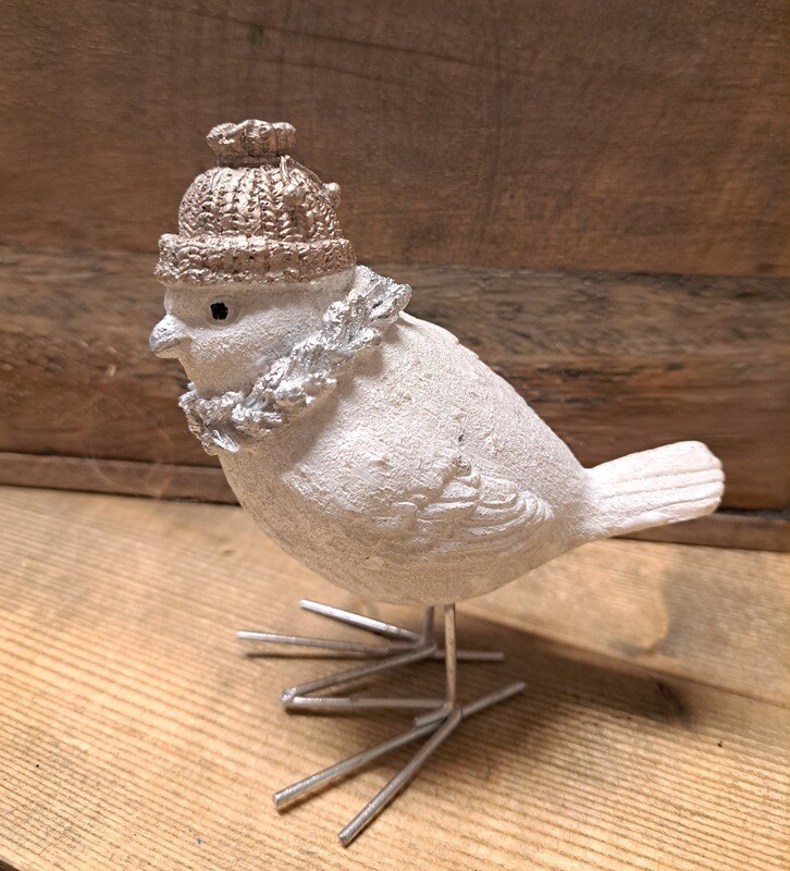 Kerstvogel met muts en krans