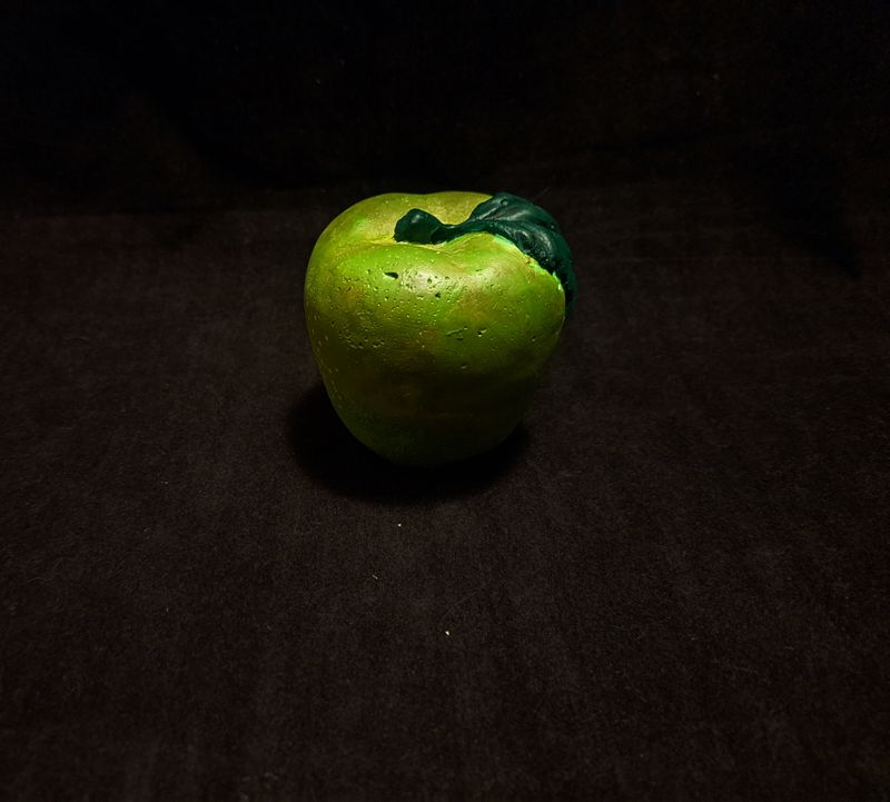 Groene betonnen appel