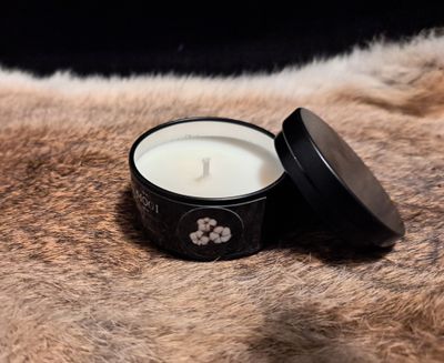 Kaars in blikje katoen