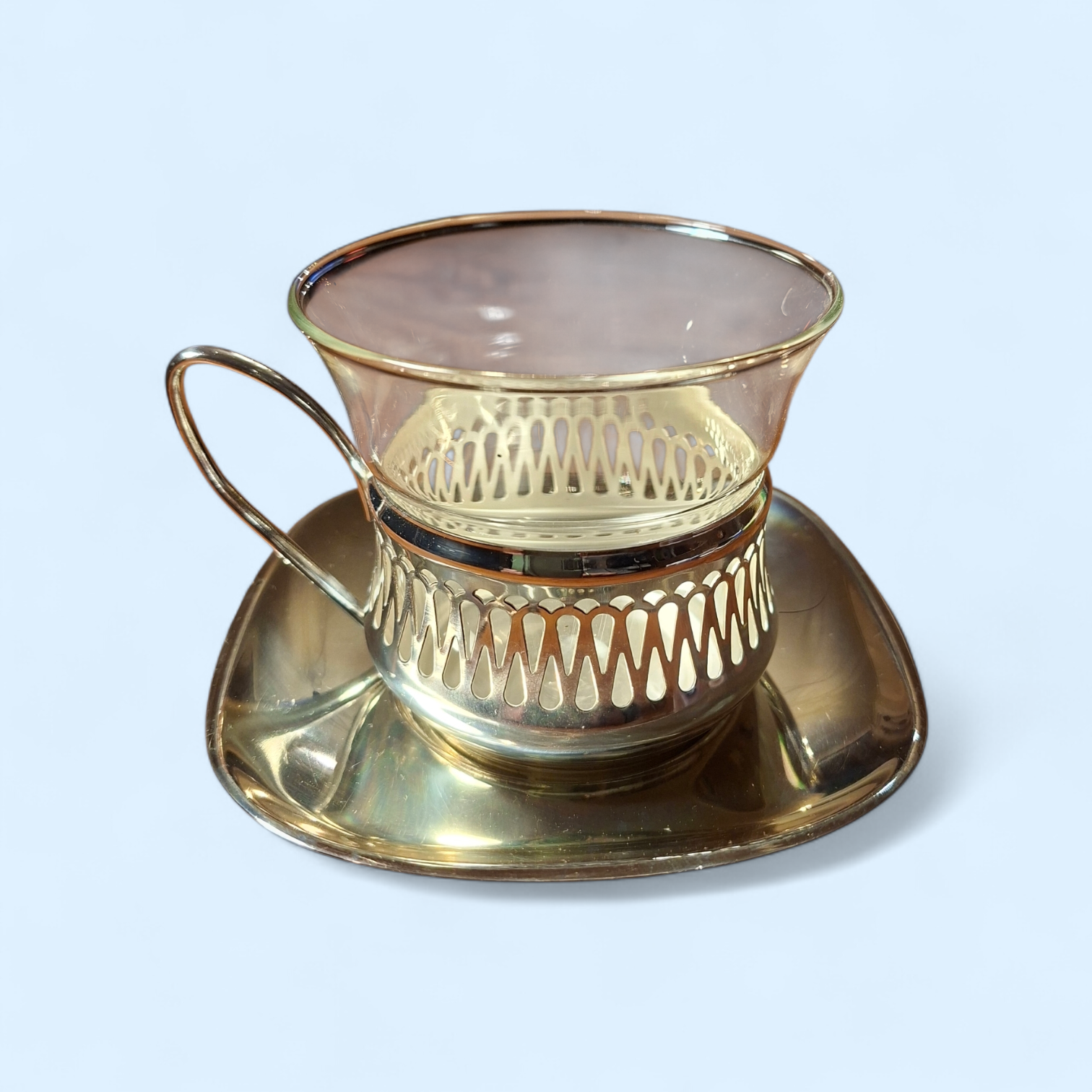 Zilverkleurige (thee) kop en schotel 1