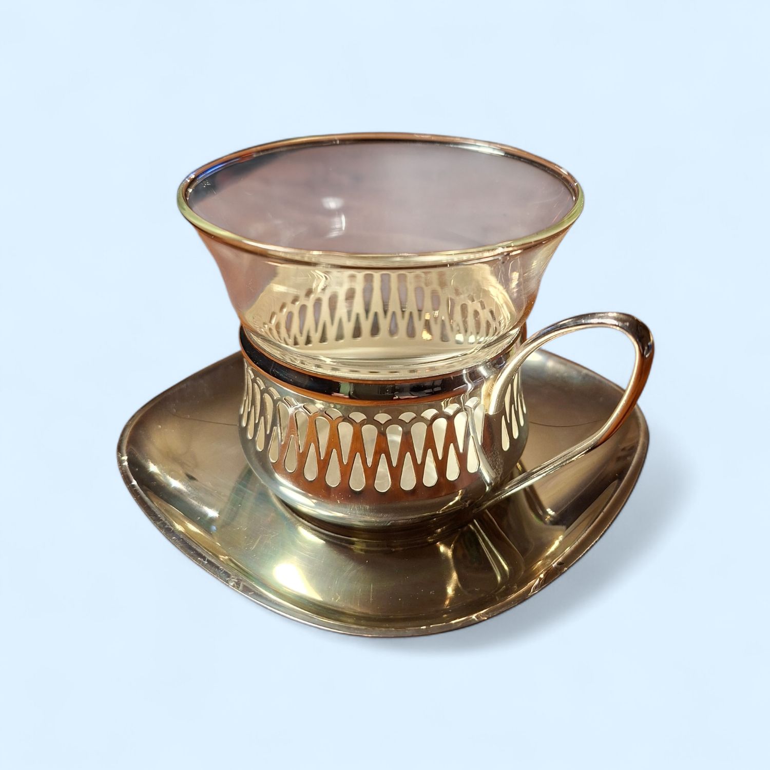 Zilverkleurige (thee) kop en schotel 1