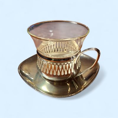 Zilverkleurige (thee) kop en schotel 1