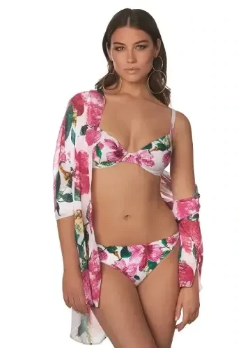 Roidal Valeria Angela Shirt Dress. Luxe chiffon shirt dress In a cool semi-sheer pink flowers on white fabric has a fashionably laid-back ‘boyfriend shirt’ styling. Shown with matching bikini.
