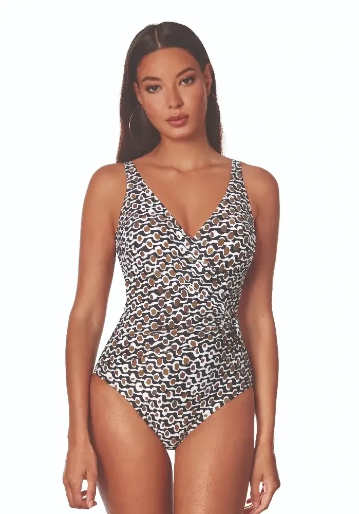 Roidal Noa Milan Crossover Control Swimsuit. Abstract Black, Brown and White print fabric. The front is lightly gathered into a side placed pearlised ring, creating the appearance of a longer, slimmer torso and a smaller waistline.