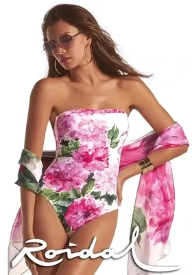 Roidal Larys Amina Bandeau Swimsuit. Pink floral design on a White background. Classic bandeau style swimsuit with detachable halterneck.