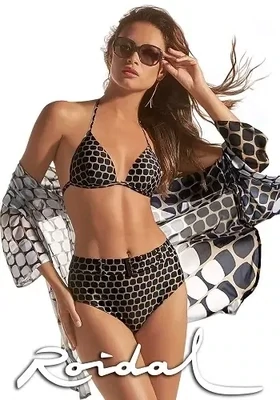 Roidal Bambu Greta Bikini. Brown and Black geometric pattern. The bikini pants are reminiscent of the famous belted bikinis worn by Ursula Andress in the Bond film Dr No. The tailored, adjustable belt has 4 belt loops plus a burnished metal buckle, eyelets, and belt tip bar.