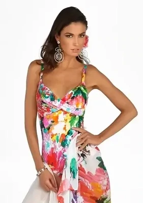 Roidal Anaia Swimsuit. Bright abstract floral design with a pixelated look. The V-neckline and crossover fabric on the bust optically slim the body.