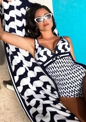  Lise Charmel Croisiere For Ever Blue and White abstract print Pareo. Shown with matching swimsuit.