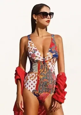 Foulard Rococo Swimsuit by Nuria Ferrer. The fabric is a colourful Versace-like Rococo print. Lifestyle photo.
