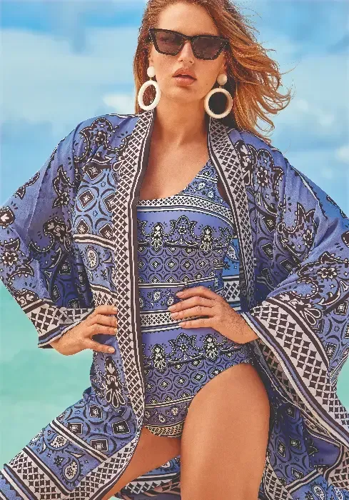 David Swimwear Panarea Summer Lavender Kimono in a lavender and Paisley fabric. Lifestyle photo.