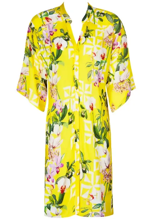Lise Charmel Jardin Delice Shirt Sun Dress in a floral pattern on a yellow background. Lifestyle photo.