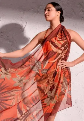 Front view of the Paradise Island Sarong by David Swimwear,  in a stylised foliage print in warm spice island autumnal shades