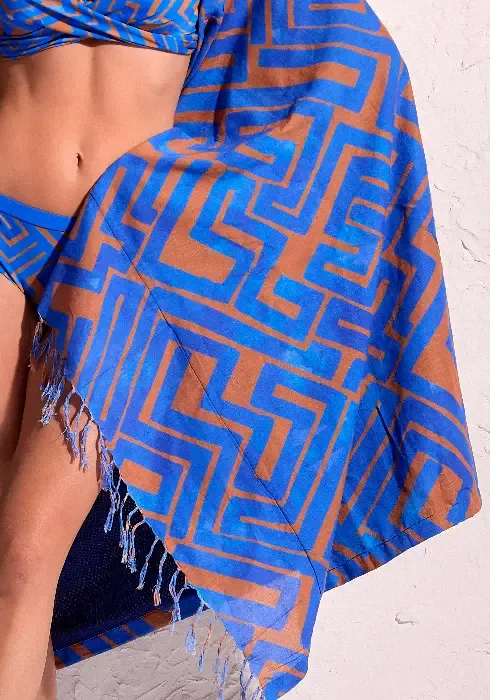 David Swimwear Freedom beach towel in a modern abstract  copper brown print on a blue background 