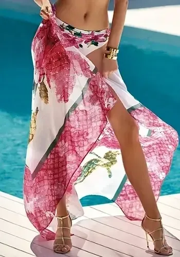 Roidal Valeria Aina Pareo. Pink floral design on a white background. Lifestyle photo by the pool.