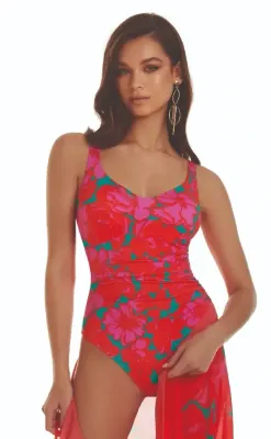 Roidal Floreale Capri Swimsuit. The fabric is a print of up-scaled blooms in bright pink and red with contrasting little flashes of emerald green. 