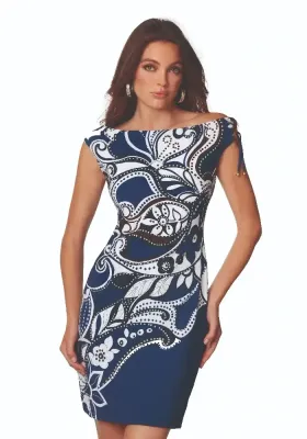 Roidal Cachemire Doria Complice Dress. Blue and White Paisley fabric. The dress falls just above the knee.  Golden tipped drawstrings at the shoulder can give a rise or fall effect. The dress can be worn on or slightly off the shoulder