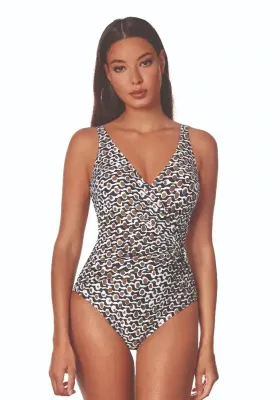 Milan Crossover Control Swimsuit by Roidal Roidal Noa Milan Crossover Control Swimsuit. Abstract Black, Brown and White print fabric. The front is lightly gathered into a side placed pearlised ring, creating the appearance of a longer, slimmer torso and a smaller waistline.