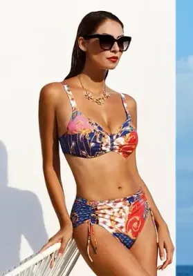 Foulard Rococo Bikini Foulard Rococo Bikini by Nuria Ferrer. The fabric is a colourful Versace-like Rococo print. Lifestyle photo.