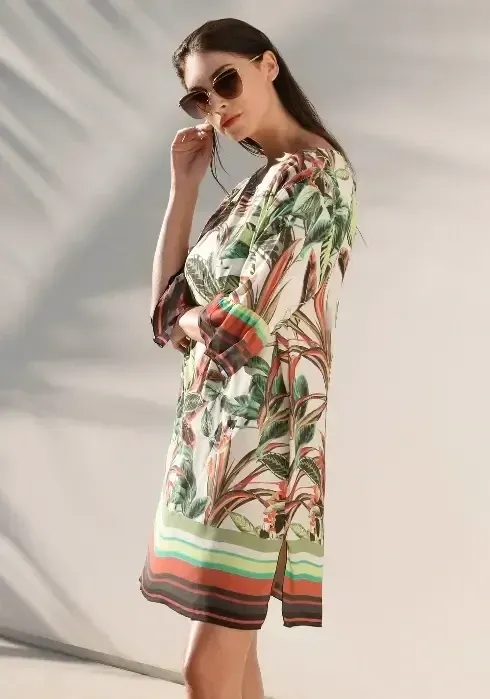 Canaima Kaftan Dress by Nuria Ferrer in a botanical print fabric. Lifestyle photo.