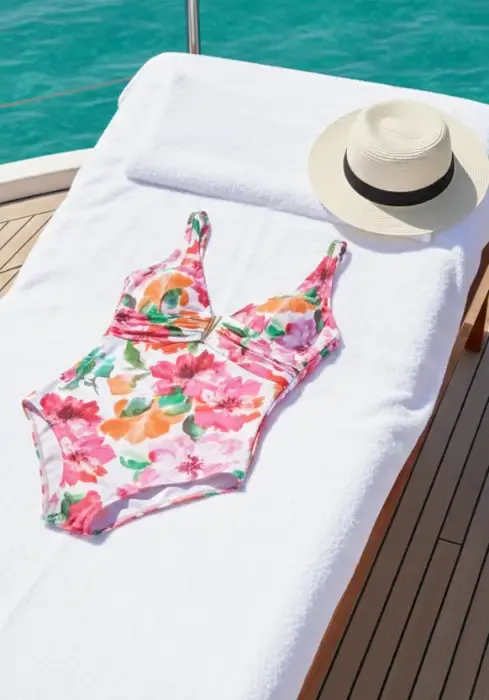 Lifestyle photo of Dalia Marina Swimsuit by Roidal in a pink floral pattern