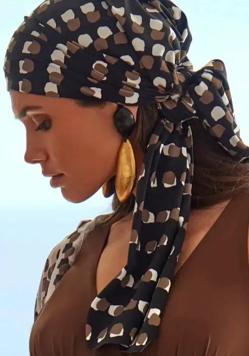 Photo of the Roidal Bambu Edna Pareo in a white, brown and black dots of varying sizes on contrasting background.