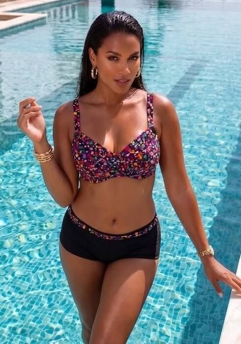Rainbow Drops Bikini A model wearing a Fashy Rainbow Drop Bikini, D cup supportive underwired top and boy short style pants give stylish coverage