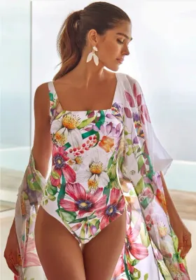 Lifestyle photo of Paraiso Paradis Comfy Swimsuit  by Roidal. The fabric is a colourful floral print on a white background.